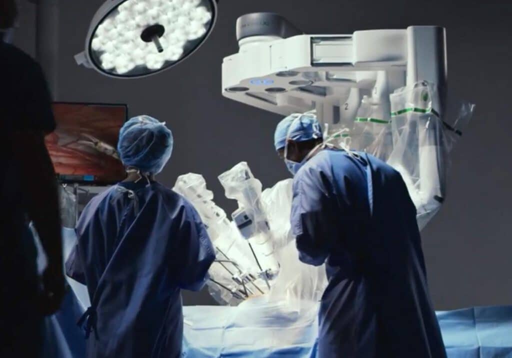 Surgeons using the daVinci robotic surgical system to perform a minimally invasive surgery