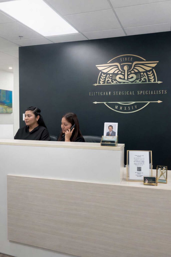 Members of the EliteCare Surgical Specialists support team at the front desk