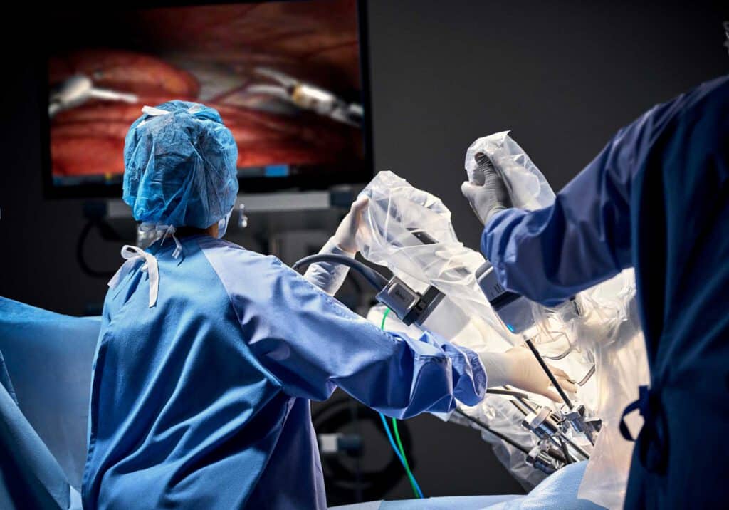 Surgeons using a Davinci robotic surgery system